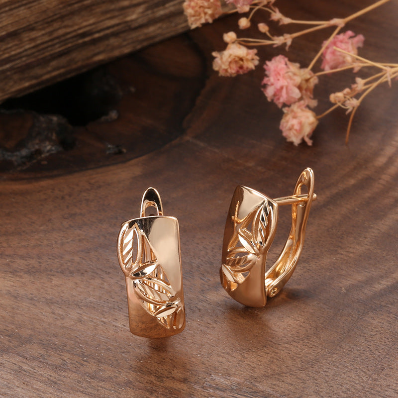 Hollow-carved Floral Earrings With A Smooth Surface