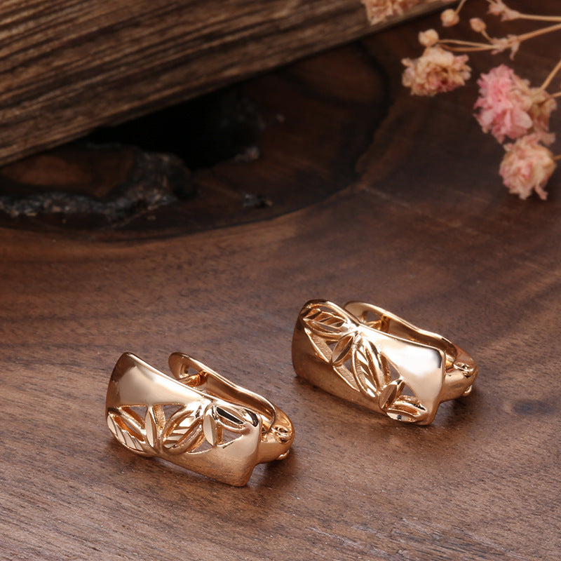 Hollow-carved Floral Earrings With A Smooth Surface